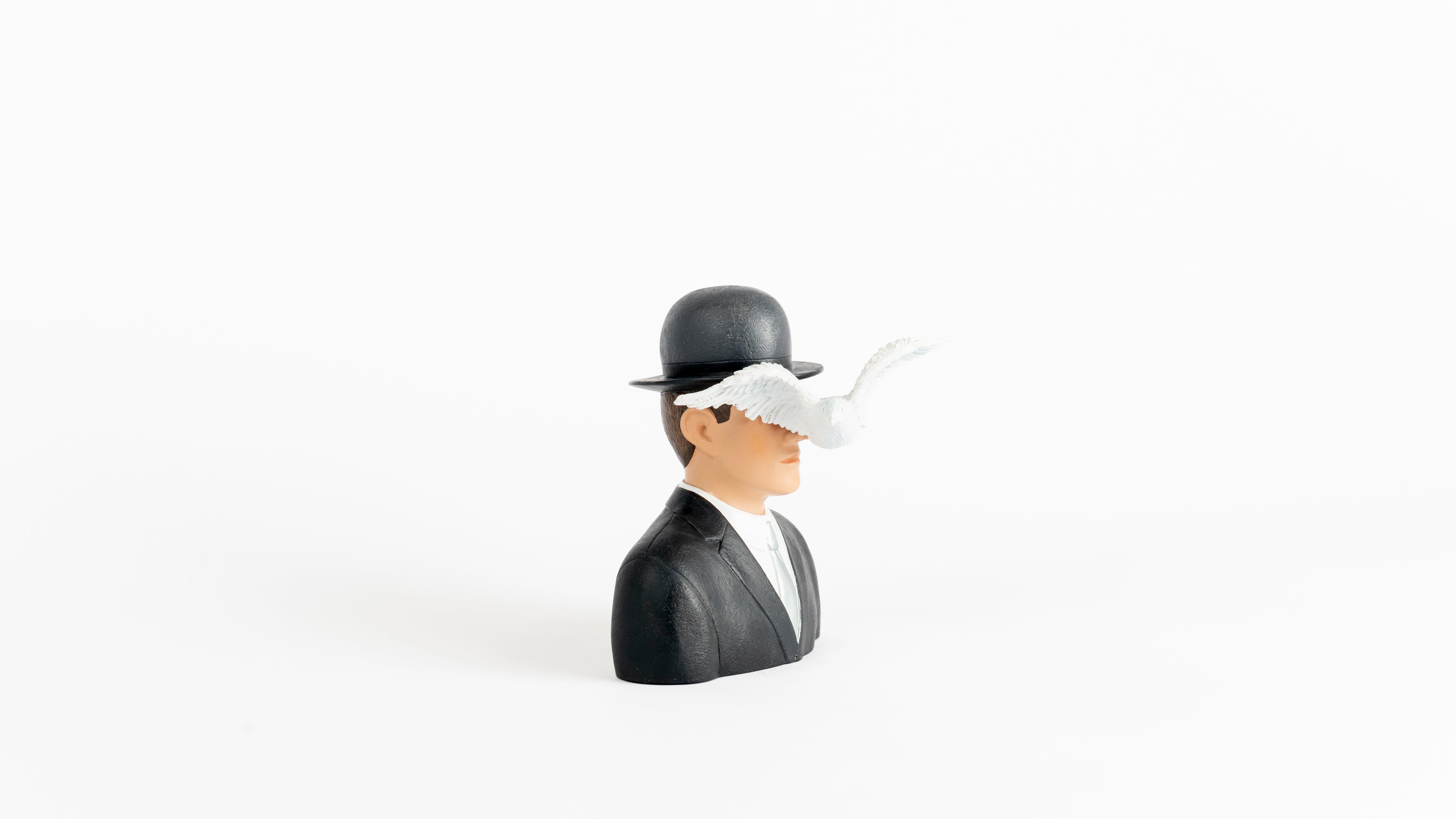 L'homme au Chapeau melon - Magritte