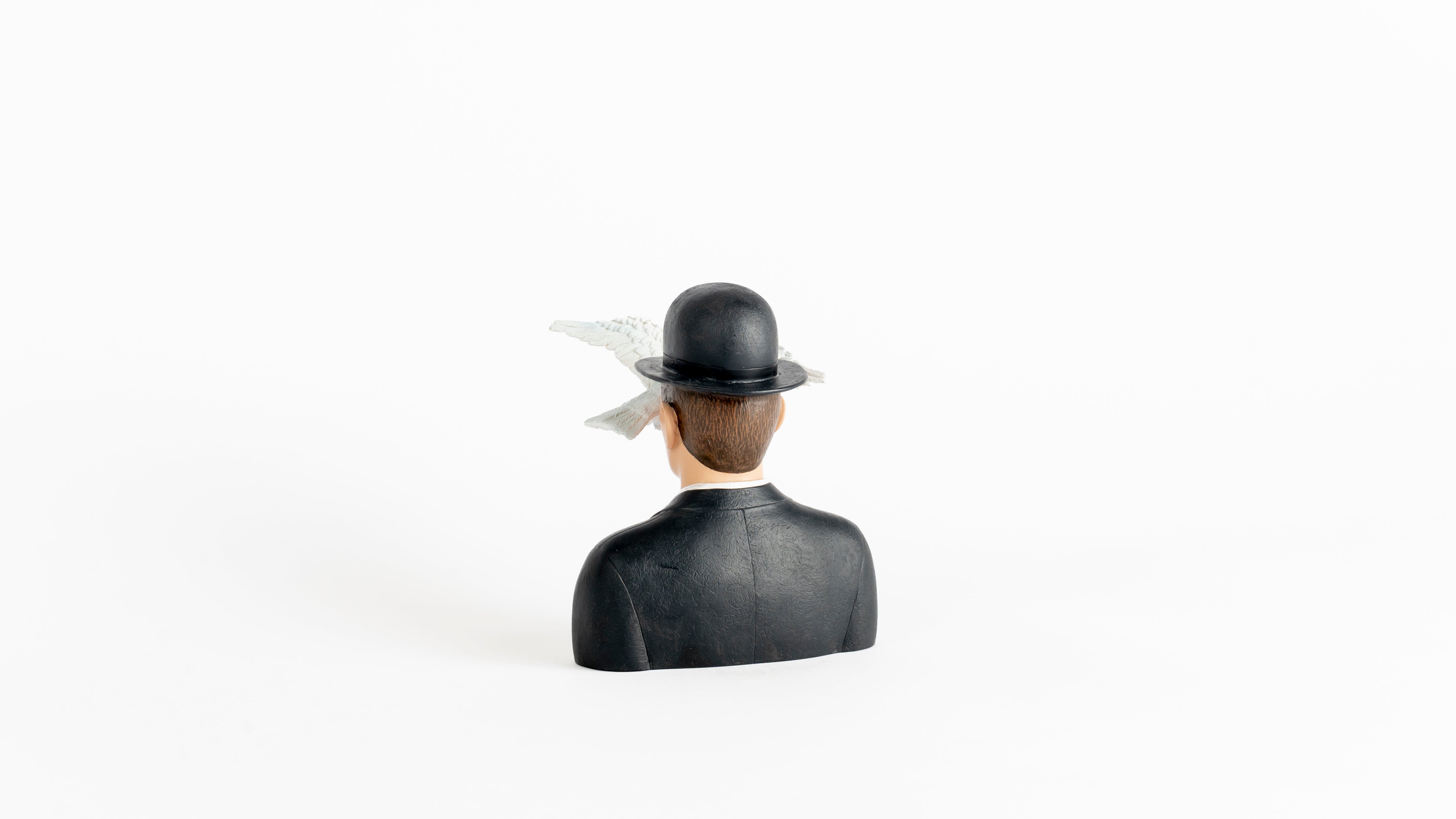 L'homme au Chapeau melon - Magritte