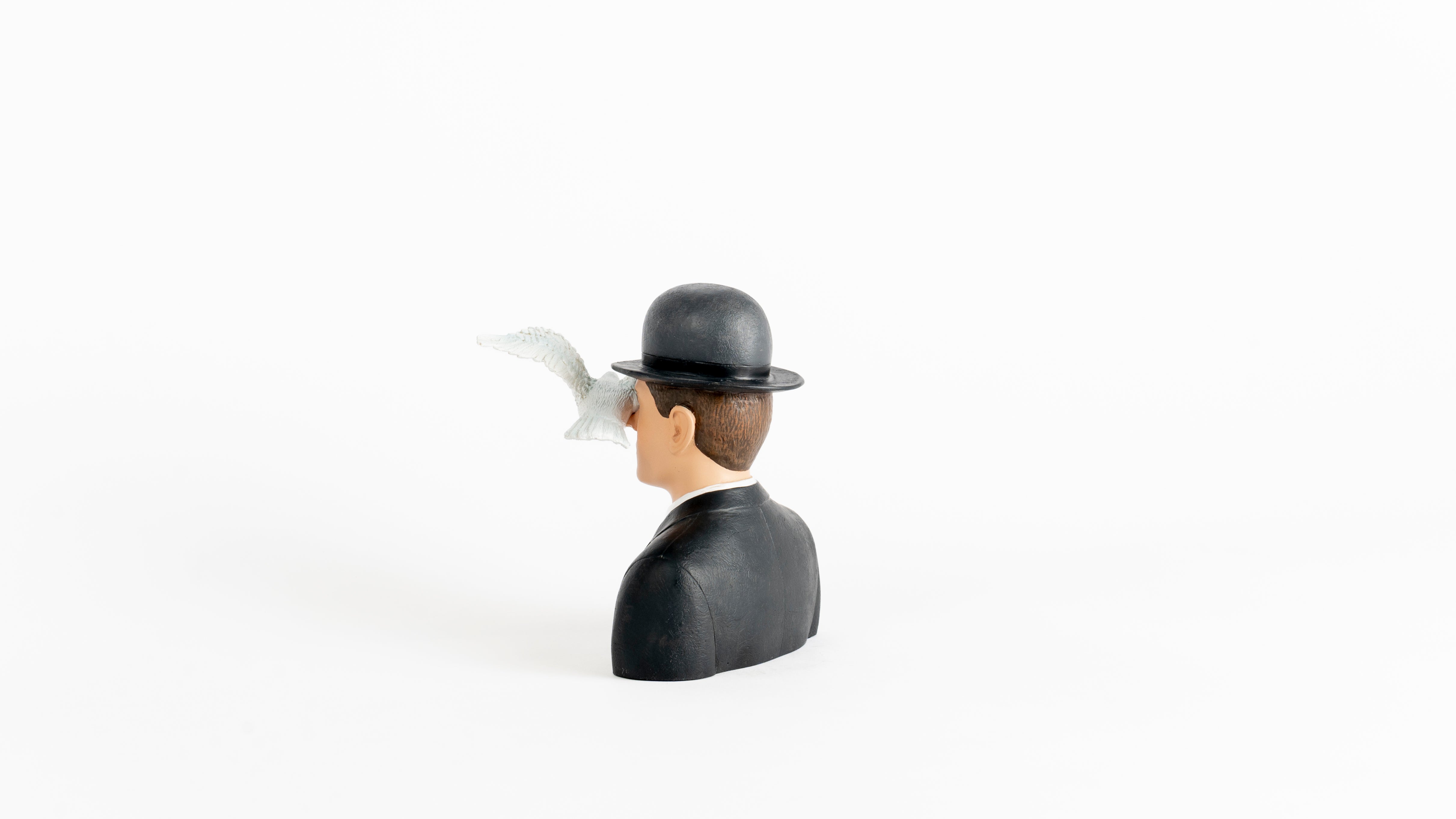 L'homme au Chapeau melon - Magritte
